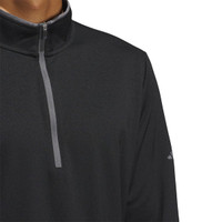A black lightweight quarter zip pullover featuring a high collar and a branding logo on the sleeve.