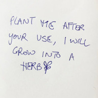 Handwritten note saying "Plant me after your use, I will grow into a herb" with a small herb drawing.