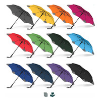 A collection of BLUNT Classic Umbrellas in various colours: grey, yellow, orange, pink, green, red, blue, black, and purple.