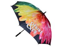 A vibrant umbrella featuring a floral design in yellow and pink hues, with a black background and a logo.