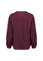 A long-sleeve blouse in a deep burgundy colour, featuring a simple back design with gathered sleeves.