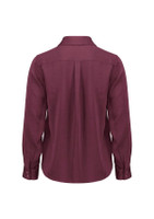 A burgundy women's long sleeve button-up shirt featuring a classic collar and a back pleat, with a logo present.