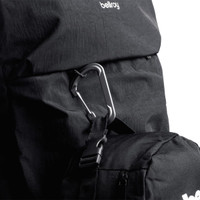 A black backpack features a carabiner and a small attached pouch, showcasing its versatile design.