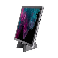 A grey phone stand displaying a tablet at an angle, featuring a sleek design with a sturdy base.