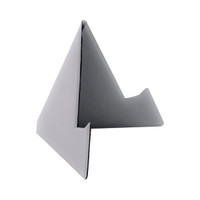 A grey, triangular phone stand designed to support devices, featuring a sleek, minimalist design and a logo.