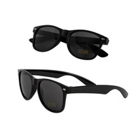 Two pairs of black sunglasses, featuring a classic design, resting against a white background.