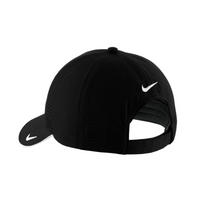 A black perforated cap with a branded logo, featuring a curved visor and adjustable strap at the back.