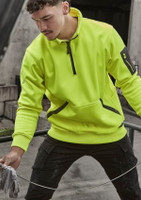 A bright yellow unisex pullover with a quarter zip, featuring a logo on the arm and a front pocket.