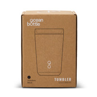 A drink bottle in an obsidian black colour, packaged in a brown box with a logo. It is a vacuum tumbler.