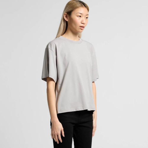 A grey t-shirt with a relaxed fit and short sleeves, featuring a logo on the garment.