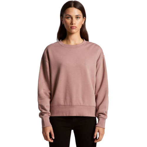 A pink jumper with a relaxed fit and long sleeves, featuring a crew neckline and a logo. A pink jumper with a relaxed fit and long sleeves, featuring a crew neckline and a logo.