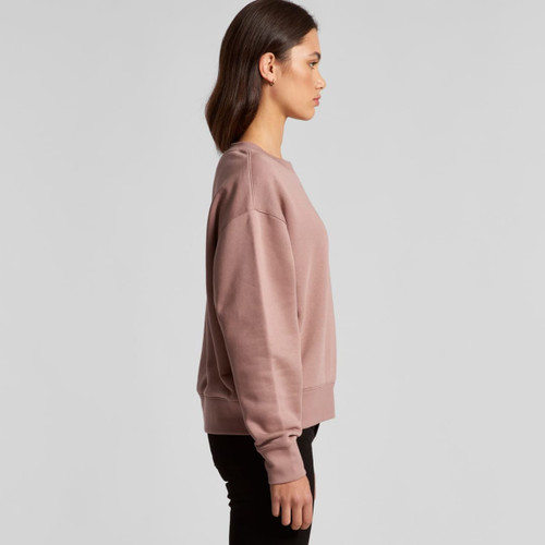 A crew jumper in a muted mauve colour, featuring a simple design and a logo on the side. A crew jumper in a muted mauve colour, featuring a simple design and a logo on the side.