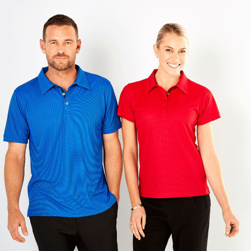 A man wearing a blue polo shirt and a blond woman reda bright blue polo shirt, both featuring button plackets and collars.