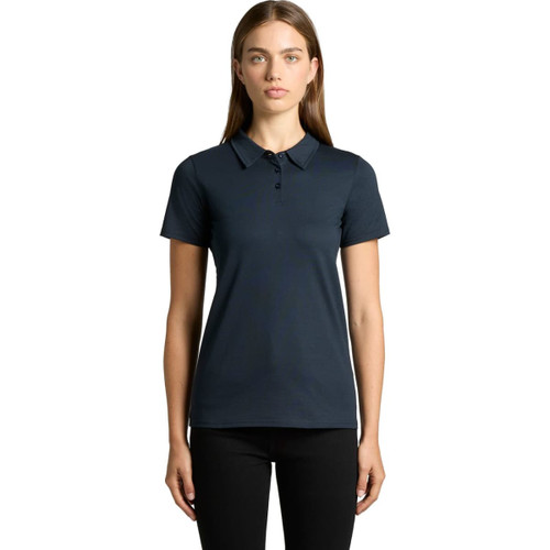 A navy blue polo shirt with a collar and buttons, featuring a logo on the chest. A navy blue polo shirt with a collar and buttons, featuring a logo on the chest.