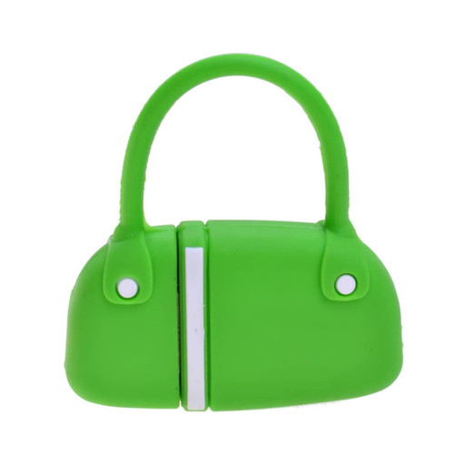 A green handbag-shaped flash drive with a handle, featuring a logo on its surface.