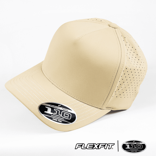 A beige cap with perforations, featuring a curved brim and a logo on the front.