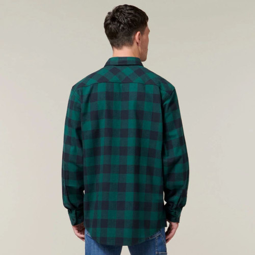 Back view of man wearing green checkered flannel shirt.