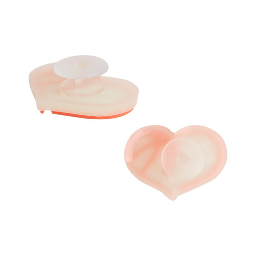 Two peach-coloured heart-shaped shoe charms with a translucent centre and an orange backing, featuring a logo.