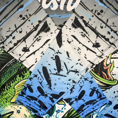 A collection of long sleeve fishing shirts in blue and grey with a fish and water pattern, featuring a logo.