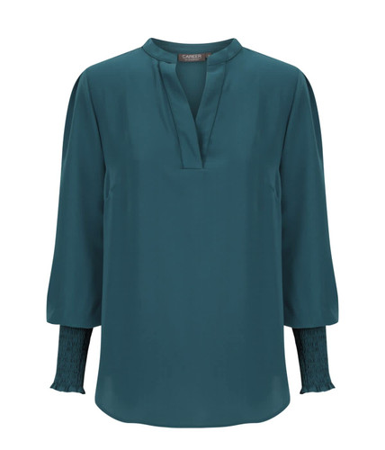 Teal long sleeve top with a V-neckline and gathered sleeve details. Features a branding logo.