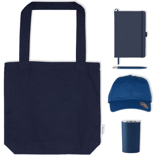 A navy tote bag, blue cap, notebook, pen, and drink tumbler, all featuring branding.