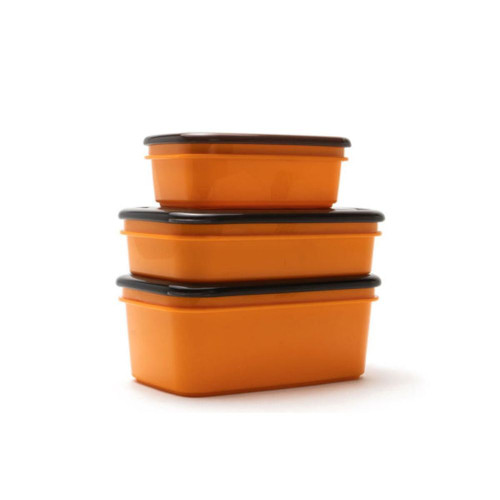 Stacked orange food storage containers with black lids.
