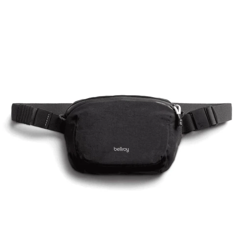 A black bum bag with a sleek design, featuring a logo and an adjustable strap.
