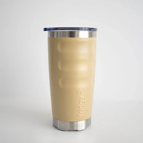 Front view of a beige fridgy® 600ml insulated tumbler featuring ergonomic grip contours, embossed branding, a stainless steel base, and a clear push-on lid.