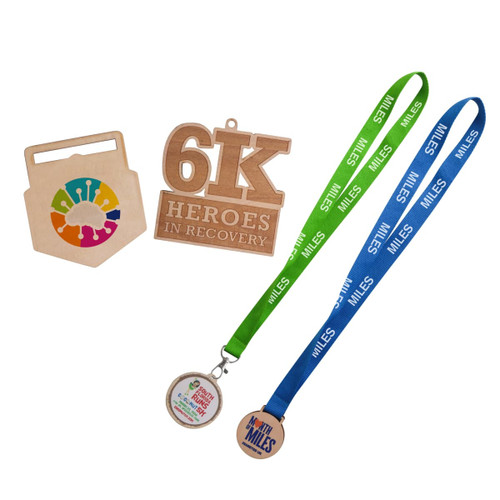 Custom-shaped wooden medals in natural wood tones, with colourful lanyards in green and blue. Includes a logo. Custom-shaped wooden medals in natural wood tones, with colourful lanyards in green and blue. Includes a logo.
