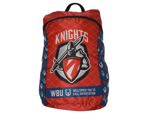 A red and navy fold-up backpack featuring a logo and shield design. It has a top handle and adjustable straps. A red and navy fold-up backpack featuring a logo and shield design. It has a top handle and adjustable straps.