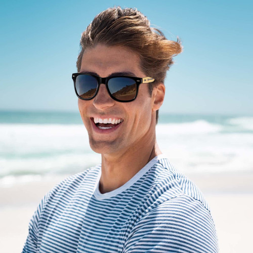 Bamboo sunglasses featuring a stylish black frame and tinted lenses. Bamboo sunglasses featuring a stylish black frame and tinted lenses.