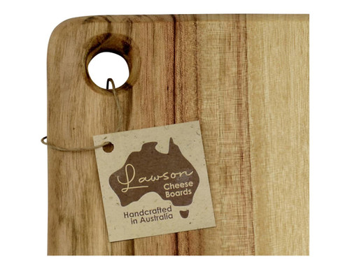 A wooden cheese board with a hole for hanging, featuring a natural finish and a tag with a logo. A wooden cheese board with a hole for hanging, featuring a natural finish and a tag with a logo.