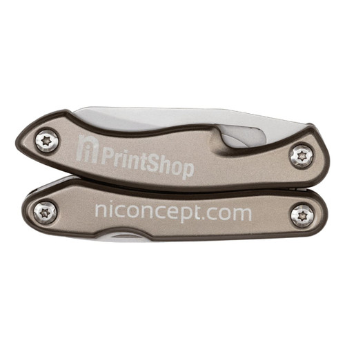 A multi-tool with a metallic bronze finish, featuring a compact design and a logo. A multi-tool with a metallic bronze finish, featuring a compact design and a logo.