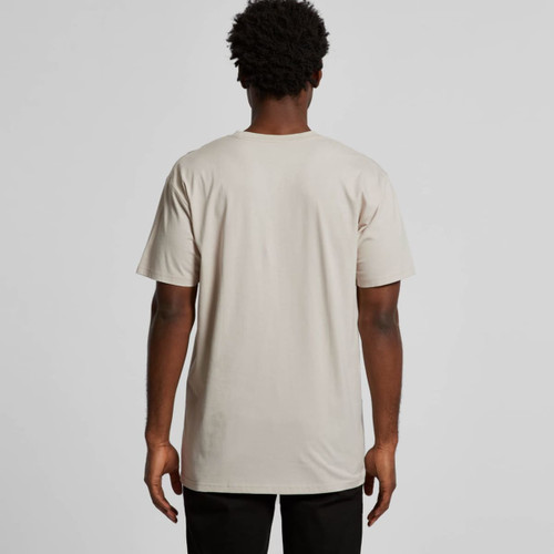 A beige T-shirt viewed from the back, featuring short sleeves and a regular fit. It has a logo visible on the back. A beige T-shirt viewed from the back, featuring short sleeves and a regular fit. It has a logo visible on the back.