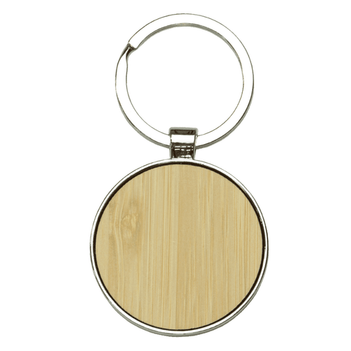 Circular keyring made of recycled zinc alloy with a bamboo surface, featuring a metal ring for attachment. Circular keyring made of recycled zinc alloy with a bamboo surface, featuring a metal ring for attachment.