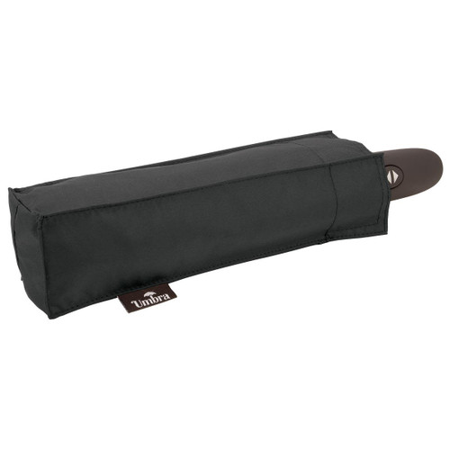 A compact black umbrella with a handle, stored in a rectangular case with a logo. A compact black umbrella with a handle, stored in a rectangular case with a logo.