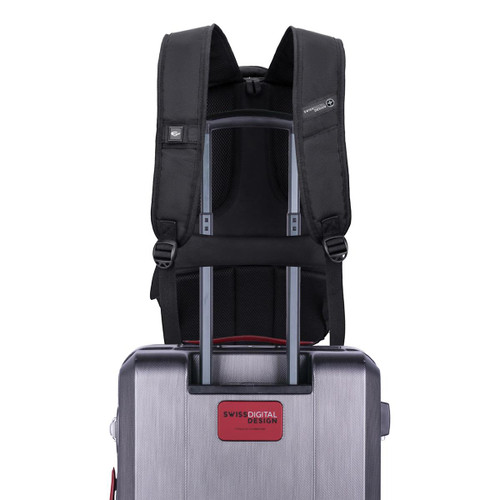 A black Swissdigital Pixel Backpack is attached to a silver trolley suitcase, featuring adjustable straps and a logo.