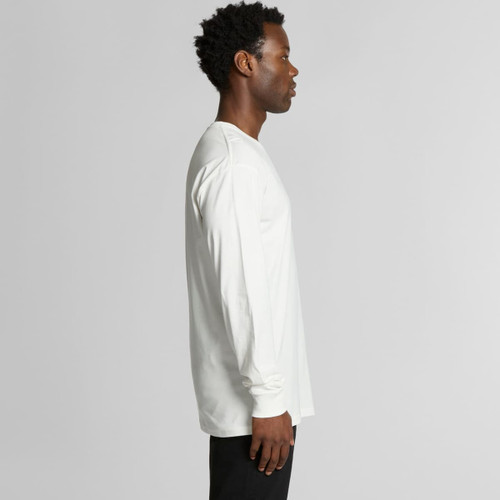 A long-sleeved organic tee in white, featuring a straight profile and a simple design with a logo. A long-sleeved organic tee in white, featuring a straight profile and a simple design with a logo.