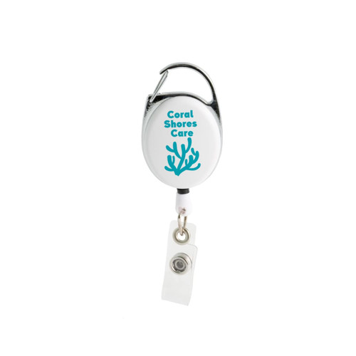 A premium retractable ID badge holder in white with a silver clip and a colorful logo. The badge holder extends with a clear strap. A premium retractable ID badge holder in white with a silver clip and a colorful logo. The badge holder extends with a clear strap.