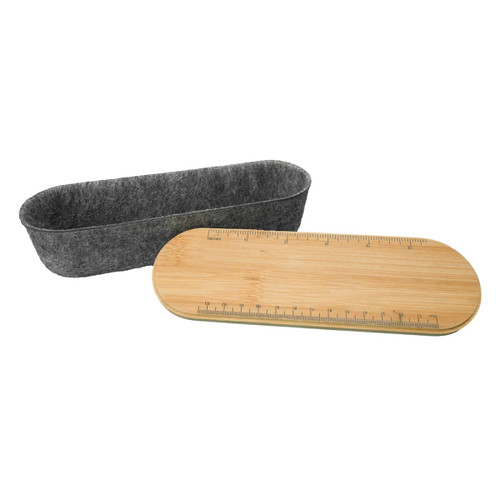 A utility case featuring a felt interior and a bamboo lid designed with a ruler. The case has an elongated oval shape. A utility case featuring a felt interior and a bamboo lid designed with a ruler. The case has an elongated oval shape.