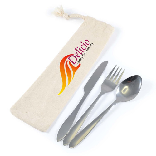 A cutlery set including a knife, fork, and spoon, packaged in a cream-colored calico pouch featuring a colorful logo. A cutlery set including a knife, fork, and spoon, packaged in a cream-colored calico pouch featuring a colorful logo.