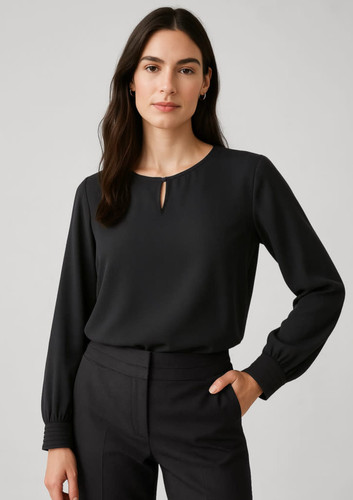 A black long sleeve blouse with a keyhole neckline, paired with tailored trousers. It has a simple, elegant design. A black long sleeve blouse with a keyhole neckline, paired with tailored trousers. It has a simple, elegant design.