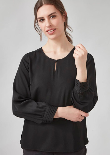 A black long sleeve blouse featuring a keyhole detail and gathered sleeves, styled on a model. A black long sleeve blouse featuring a keyhole detail and gathered sleeves, styled on a model.