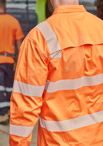 An orange work shirt with segmented reflective tape, designed for visibility in work environments. An orange work shirt with segmented reflective tape, designed for visibility in work environments.