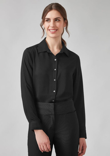 A black long sleeve shirt for women with a collared neck and button-up design. The model is wearing it with black trousers. A black long sleeve shirt for women with a collared neck and button-up design. The model is wearing it with black trousers.