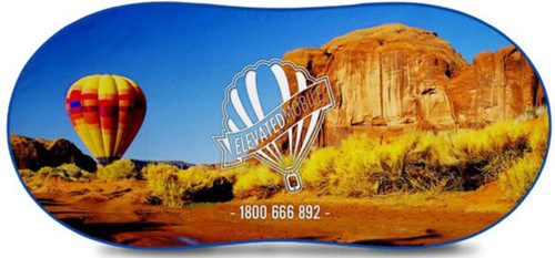 A full-colour sunshade featuring a scenic landscape with a hot air balloon and desert terrain, adorned with a logo. A full-colour sunshade featuring a scenic landscape with a hot air balloon and desert terrain, adorned with a logo.