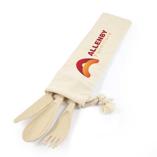 A cutlery set in a calico pouch featuring a logo. The set includes a knife, fork, and spoon. A cutlery set in a calico pouch featuring a logo. The set includes a knife, fork, and spoon.