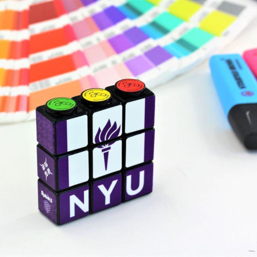 NYU-themed Rubik's Cube with color swatches and highlighters.