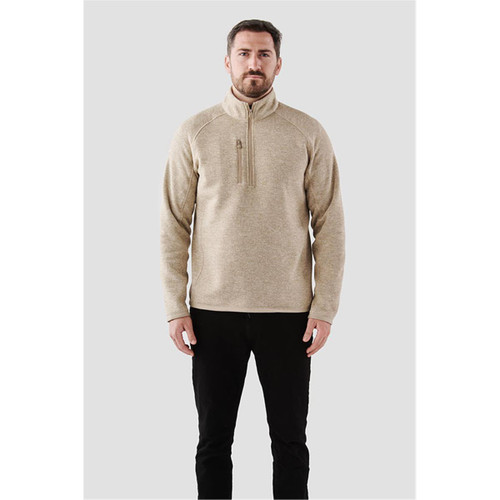 A men's 1/4 zip pullover in a light beige colour, featuring a front zip pocket and a branded logo. A men's 1/4 zip pullover in a light beige colour, featuring a front zip pocket and a branded logo.