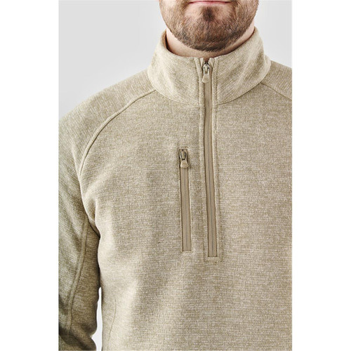 A men's pullover in a light khaki colour with a quarter zip and a small zip pocket on the chest. A men's pullover in a light khaki colour with a quarter zip and a small zip pocket on the chest.